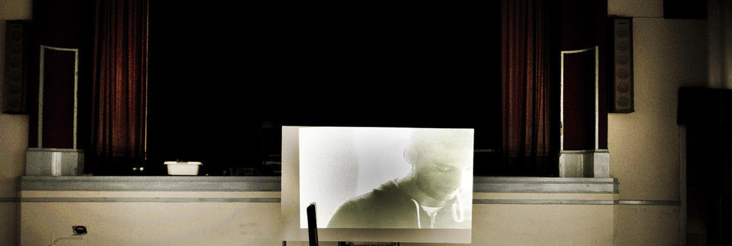 A projected portrait inside the Convento da Saudação performance space