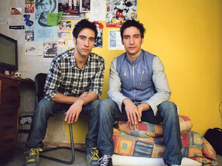 Luca and Gabriele Stifani seated together in London — portrait by Carlotta Cardana