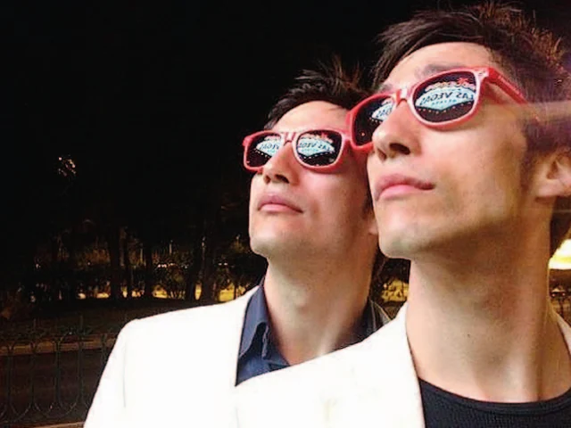 Luca and Gabriele Stifani wearing red sunglasses in the Auguri Salento feature