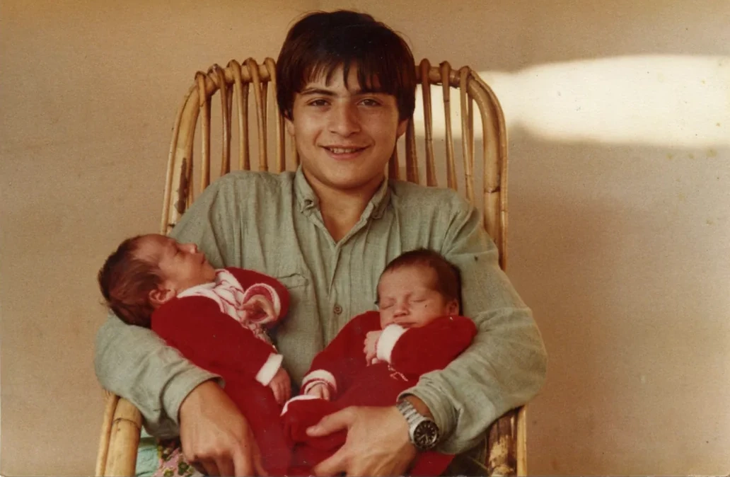 Nino with Luca and Gabriele as babies — photograph from the original article.