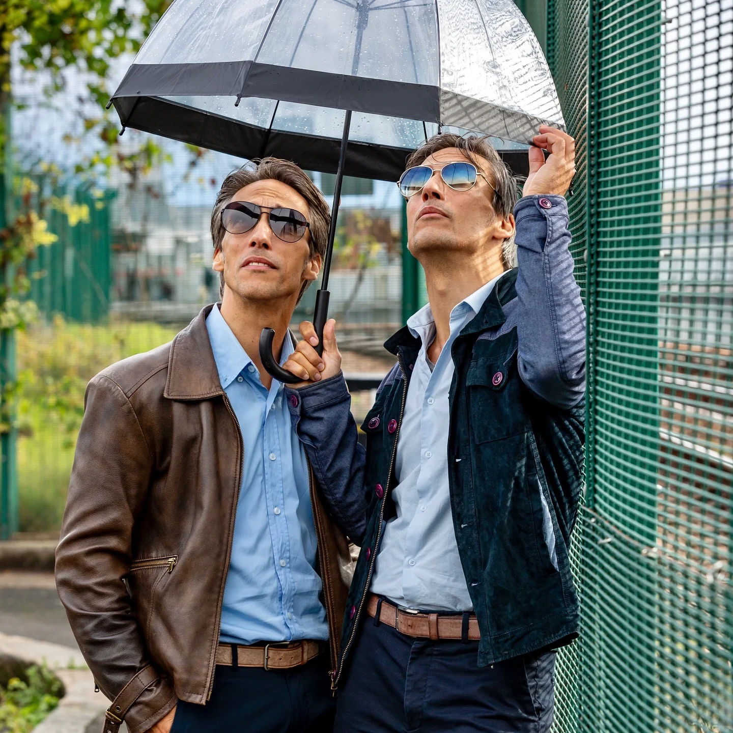 Luca and Gabriele Stifani under an umbrella